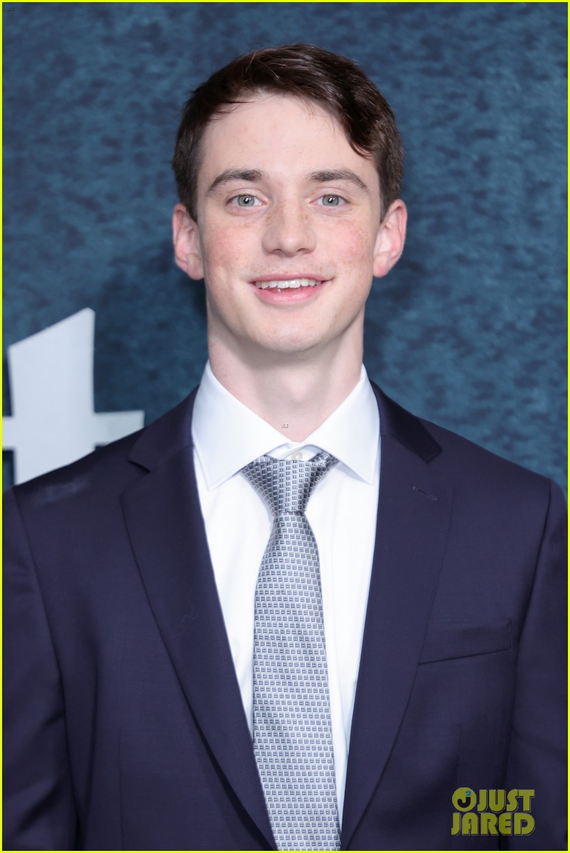 mila-kunis-wears-black-mini-dress-thigh-high-boots-for-luckiest-girl