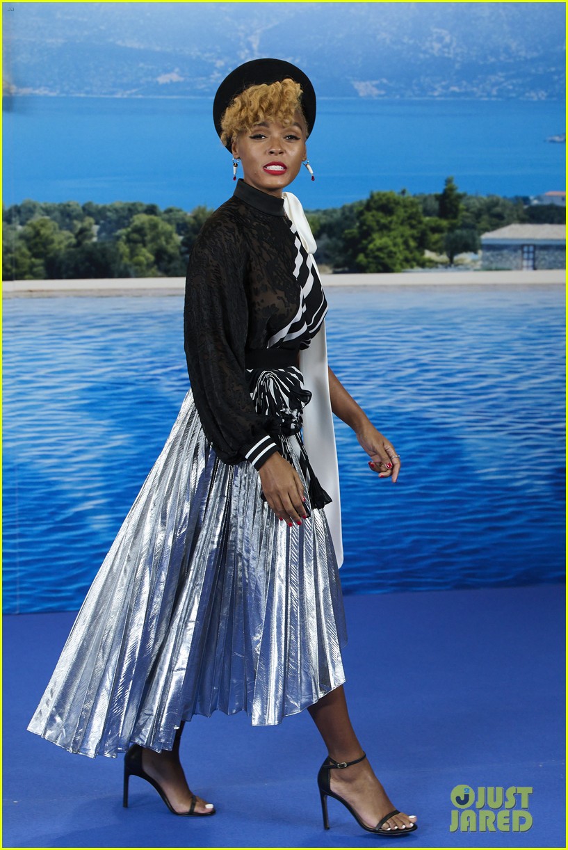 Janelle Monae Rules The Red Carpet in Textured Red Dress For 'Glass