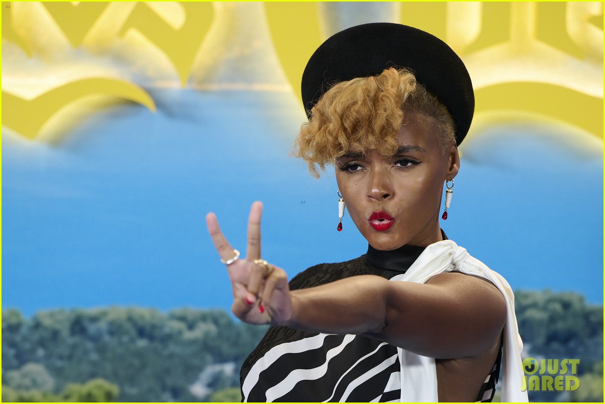 Janelle Monae Rules The Red Carpet in Textured Red Dress For 'Glass