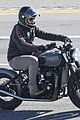 gerard butler hops on his motorcycle 01