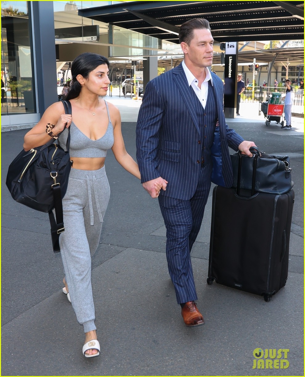 John Cena Looks Sharp in Pin-Striped Suit While Arriving in Australia