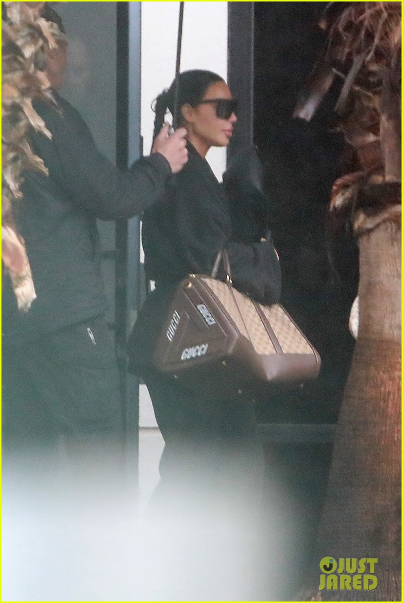 Khloe Kardashian Lands Back in LA With Sister Kim Following Tristan