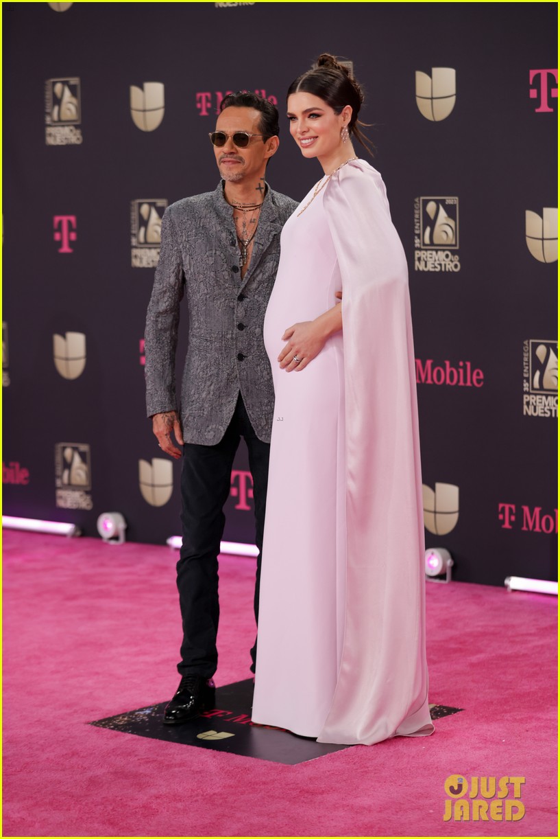 Marc Anthony Cradles Wife Nadia's Baby Bump While Walking Red Carpet at