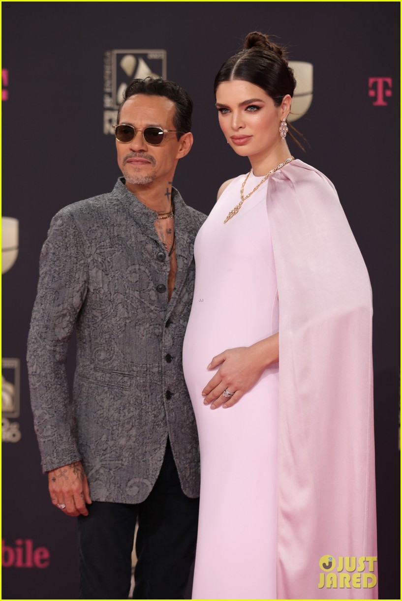 Marc Anthony Cradles Wife Nadia's Baby Bump While Walking Red Carpet at