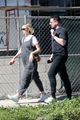 carey mulligan cradles baby bump out getting coffee with a friend 01