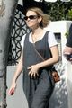 carey mulligan cradles baby bump out getting coffee with a friend 02