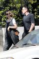 carey mulligan cradles baby bump out getting coffee with a friend 09