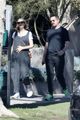 carey mulligan cradles baby bump out getting coffee with a friend 16