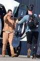 ashton kutcher mila kunis return home after ski trip 11