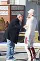 brad pitt tongue sherpa outfit wolves george clooney filming 01