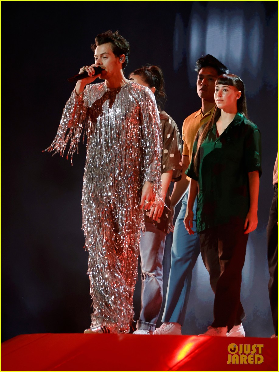 Harry Styles Wears Silver Fringe Outfit While Performing Nominated Song