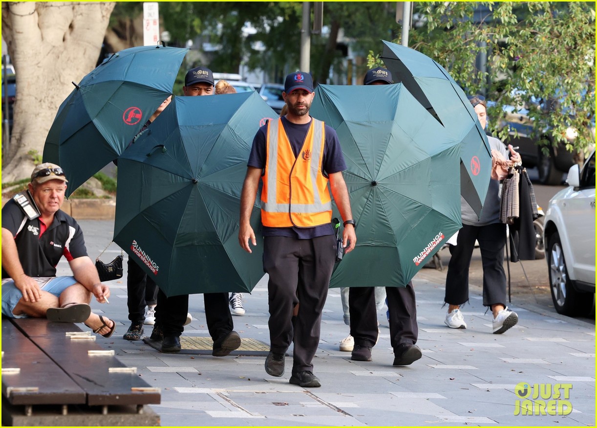 Sydney Sweeney Gets Covered By Giant Umbrellas While Shooting Top