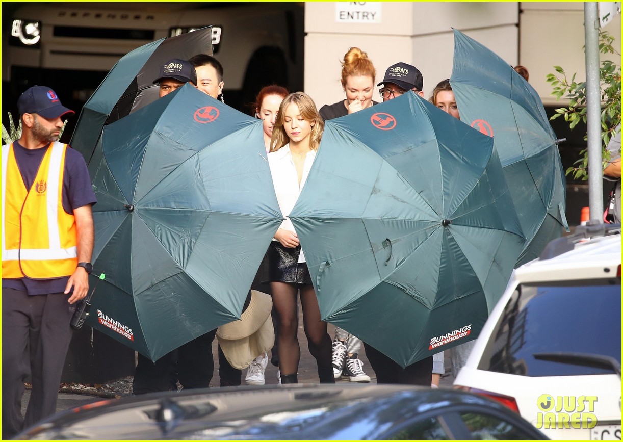 Sydney Sweeney Gets Covered By Giant Umbrellas While Shooting Top