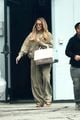 khloe kardashian full glam sweats leaving the studio 03
