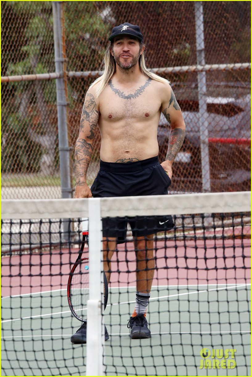 Shirtless Pete Wentz Enjoys a Tennis Match, Shows Off His Long Blonde Hair on the Court Photo