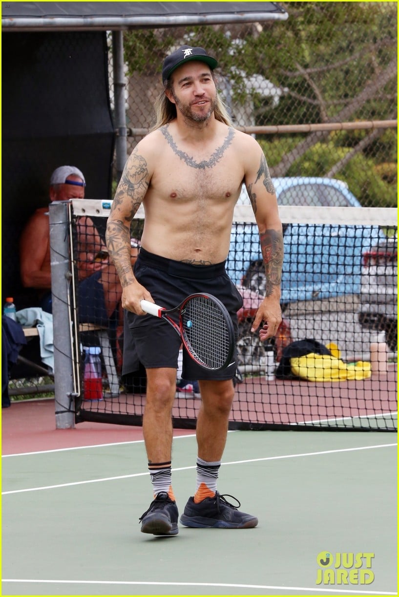 Shirtless Pete Wentz Enjoys a Tennis Match, Shows Off His Long Blonde Hair on the Court Photo