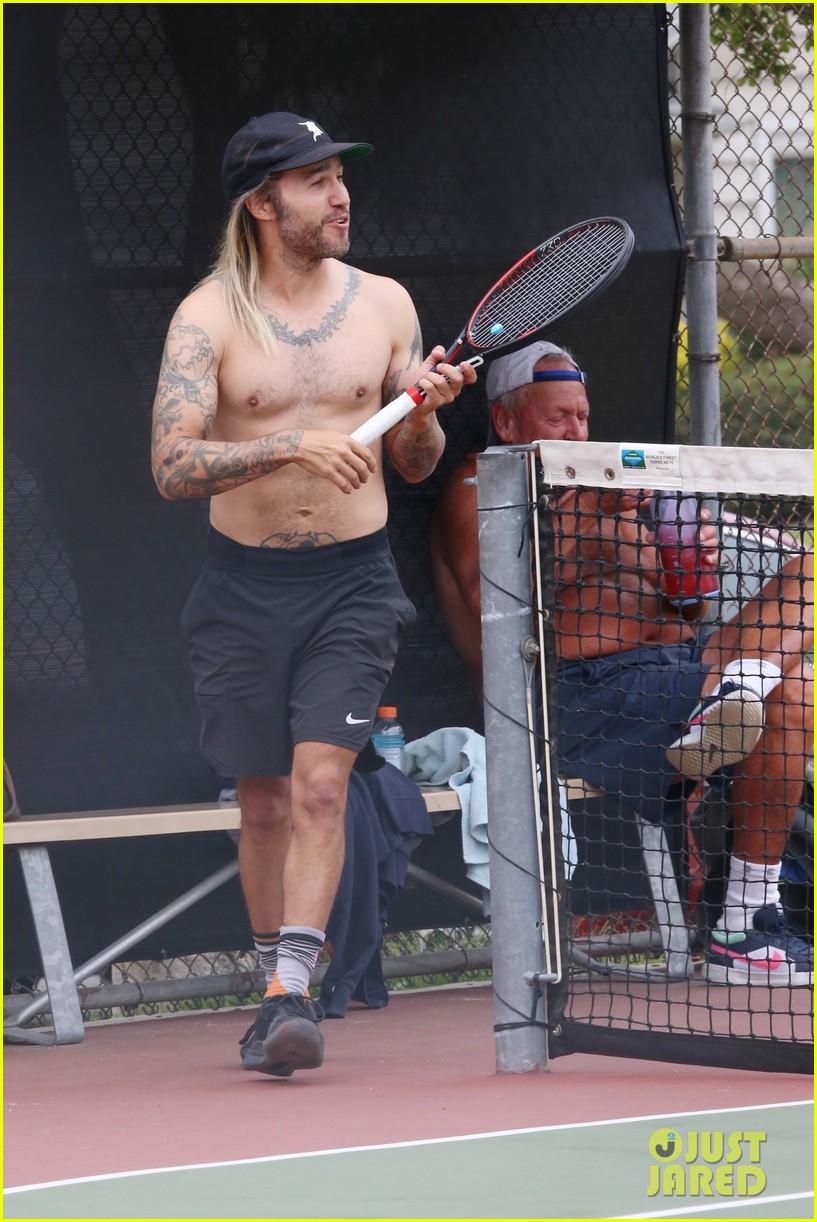 Shirtless Pete Wentz Enjoys a Tennis Match, Shows Off His Long Blonde Hair on the Court Photo