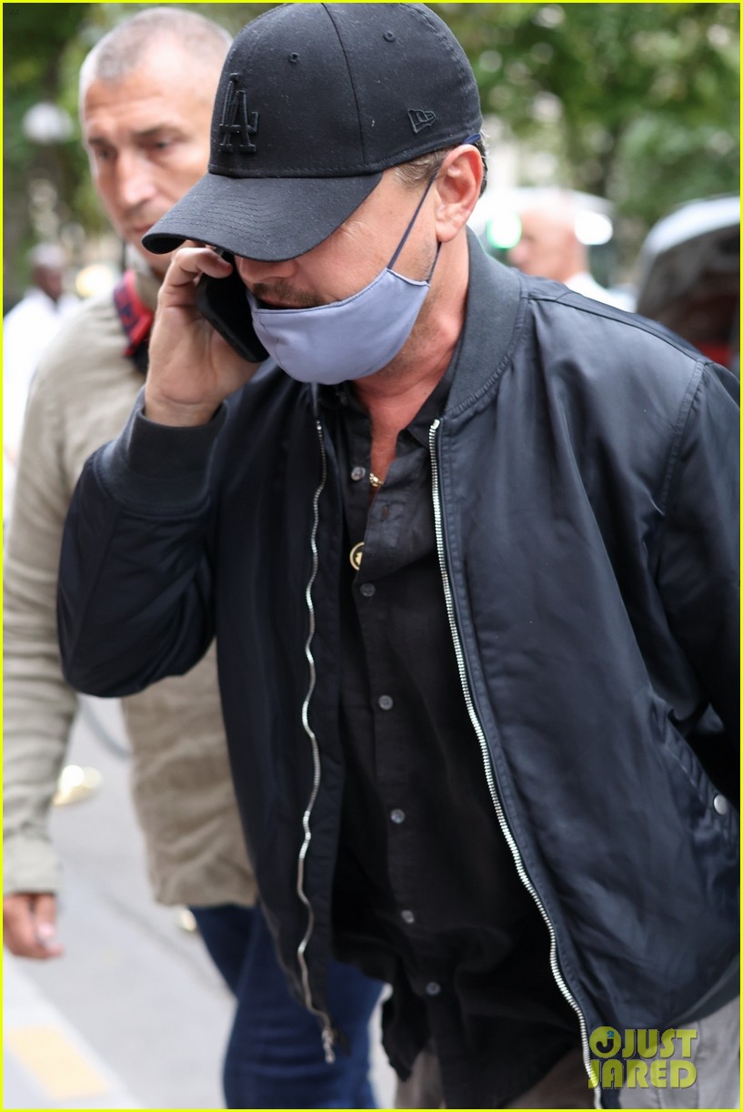 Leonardo DiCaprio & Tobey Maguire Wear Matching Jewelry During Paris