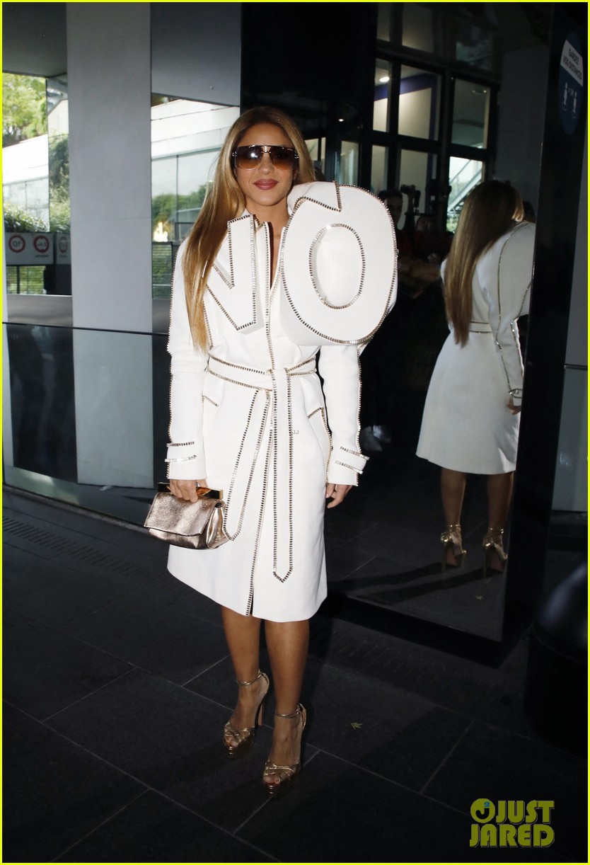 Shakira Rocks Zippered 3D 'No' Trench For Viktor & Rolf Show in Paris