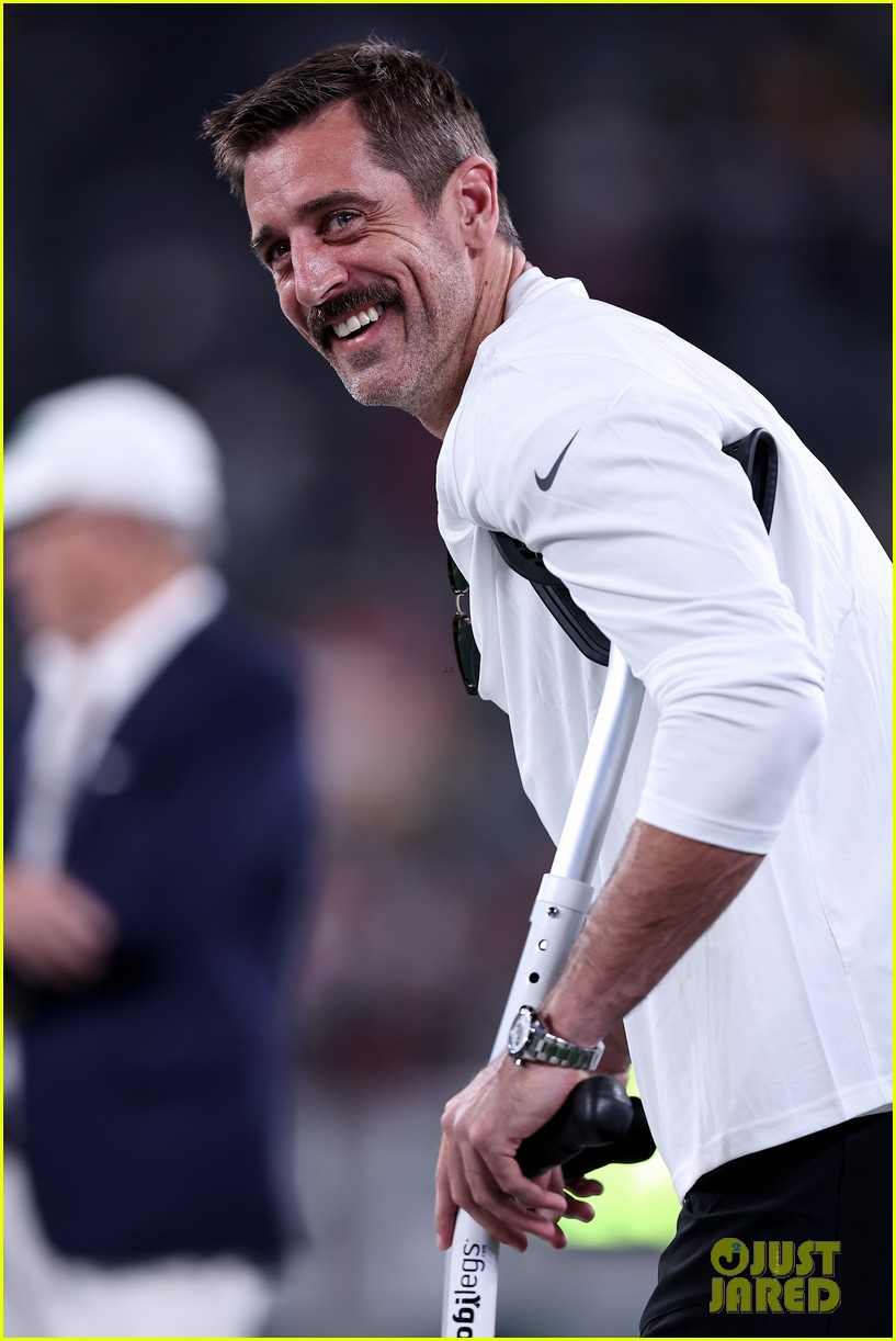 Here's Why Aaron Rodgers Is On Crutches at Jets vs Chiefs Game Photo