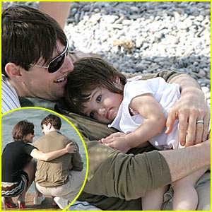 Tom Cruise Cradles Baby Suri