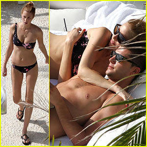 Whitney Port wears a bikini with one shoulder strap while on vacation with ...