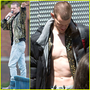 Matt Smith shows off his slim shirtless body while stepping out of his trai...