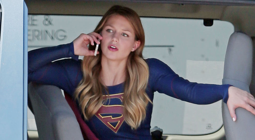 Melissa Benoist sits in a van while taking a call on the set of her upcomin...