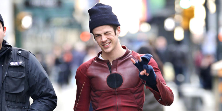 Grant Gustin flashes a smile on the set of The Flash on Tuesday (February 9...