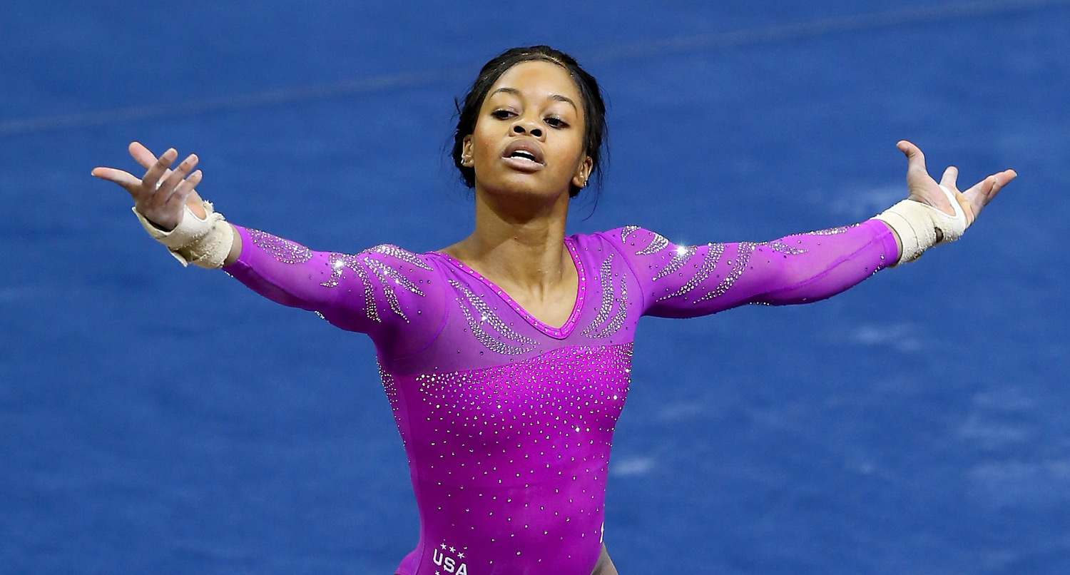 Gabby Douglas performs her floor exercise during the 2016 AT&T Amer...