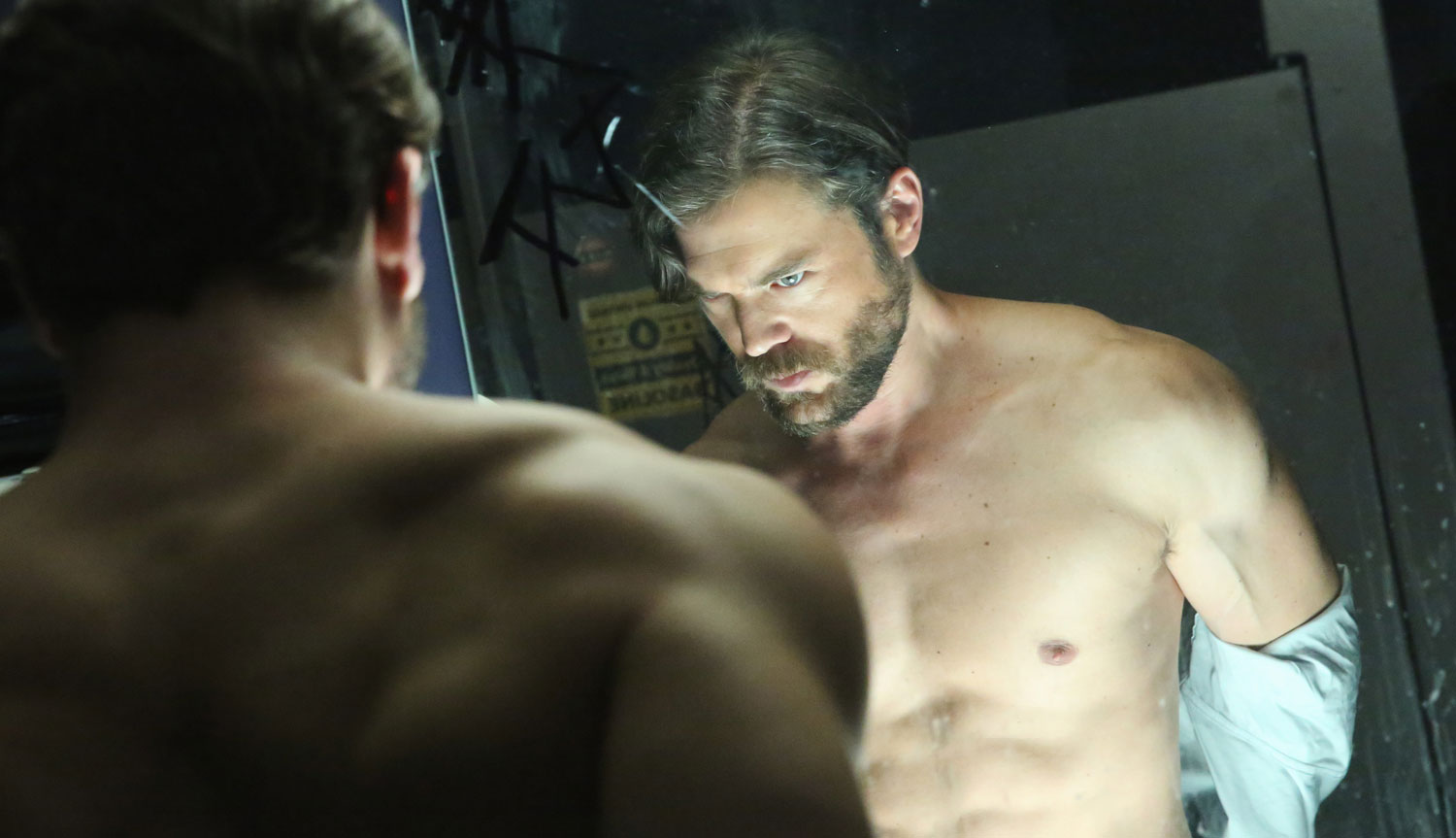Charlie Weber shows off his hot bod while ripping off his shirt in one of t...