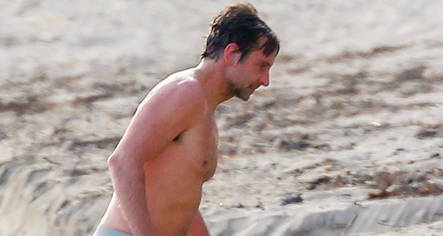 Bradley Cooper Goes Shirtless For Quick Ocean Swim.