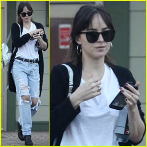 Dakota Johnson Chile - SPL913156_031 EXCLUSIVE: Dakota Johnson wears a  leopard print dress and a black coat in West Hollywood. Dakota was all  smiles as she headed out to get her nails