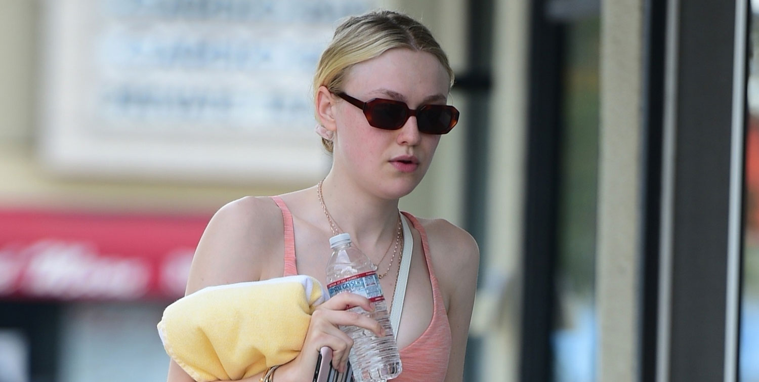 Dakota Fanning Looks Back On Her First Met Gala Dakota Fanning Just