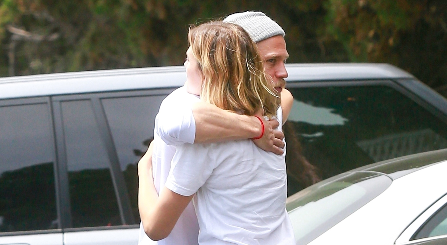 Charlie Hunnam Hugs a Friend After Grocery Store Run-In.