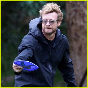Simon Baker Plays Fetch with His Dog in Australia