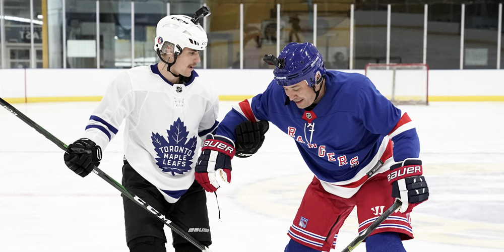 Is he playing hockey yes he is. Is he playing hockey yes he is