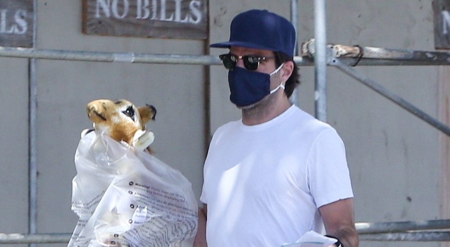 Zachary Quinto Carries Giant Stuffed Giraffe While Heading to a
