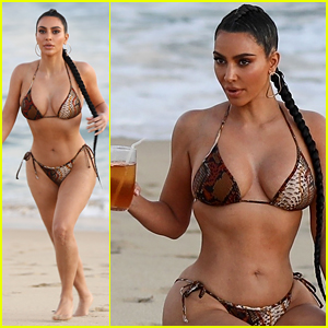 Kim Kardashian Flaunts Her Curves in a Bikini - See the Beach Photos!