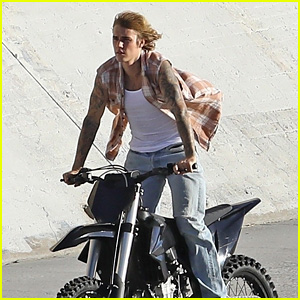 Justin Bieber Rides a Motorcycle While Seemingly Filming a New Music Video (Photos)