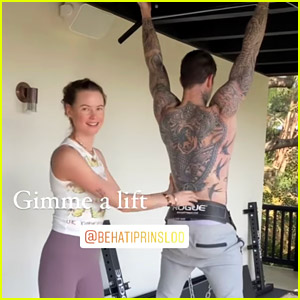 Behati Prinsloo Helps Spot Adam Levine During His Shirtless Workout at Home