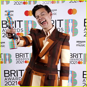 Harry Styles Carries a Purse on BRITs 2021 Red Carpet After Winning Award!