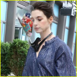 Anne Hathaway Wears Faceshield Covered with Stickers on 'WeCrashed' Set