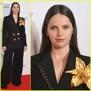 Felicity Jones Adds A Golden Flower To Her 'Last Letter From Your Lover' Premiere Suit