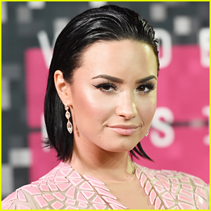 Demi Lovato Comes Under Fire for Partnering With 'Hub for QAnon' Conspiracy Website