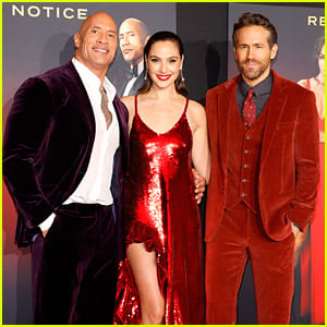 Gal Gadot & Ryan Reynolds Wore Red For 'Red Notice' Premiere With Dwayne Johnson