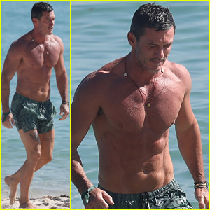 Shirtless Luke Evans Gets In a Beach Day in Miami
