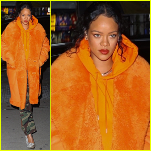 Rihanna Steps Out In An Vibrant Orange Coat After Donating $15 Million To Fight Climate Change