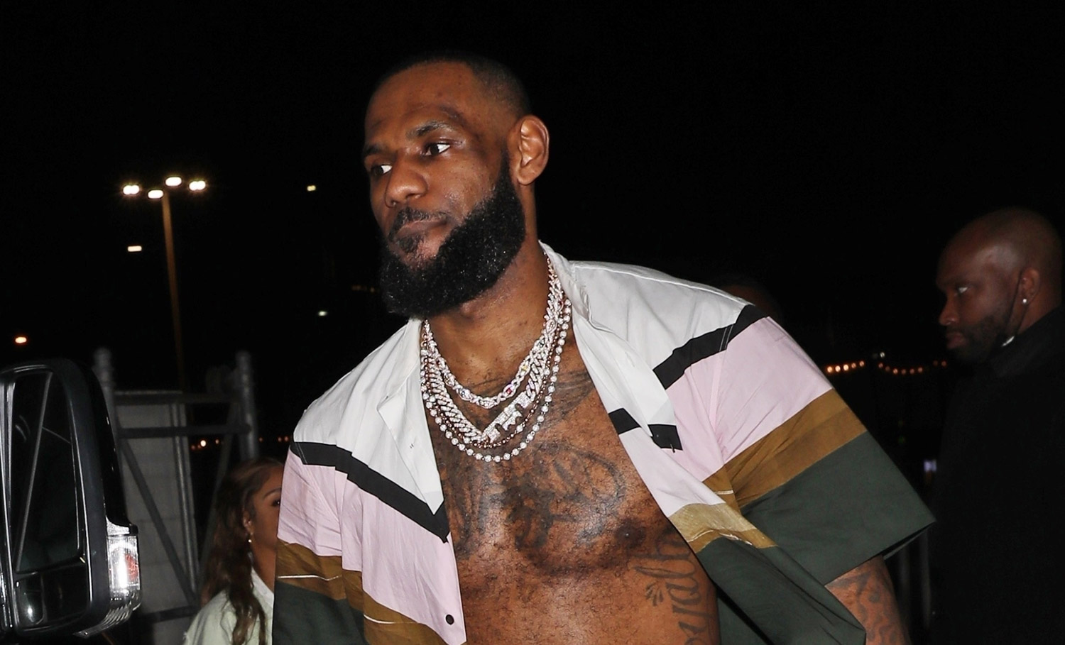 LeBron James Wears His Shirt Unbuttoned, Flashes Body at Super Bowl