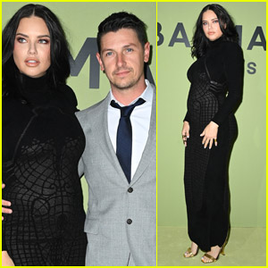 Adriana Lima Shows Off Her Baby Bump at Balmain Fashion Show with Boyfriend Andre Lemmers